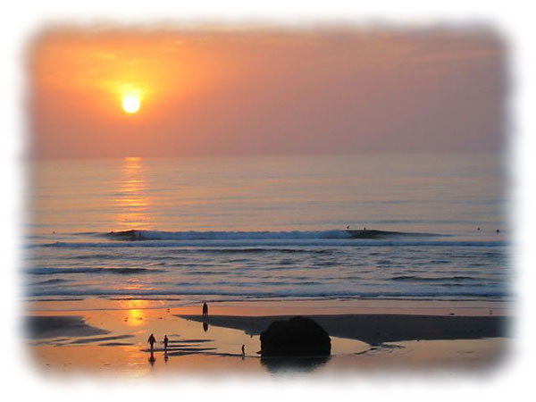 Sunset Surfers at Salmon Creek Photo